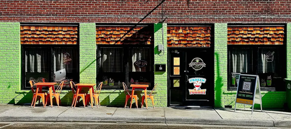 The green Stone Mountain Yogurt storefront on Main Street